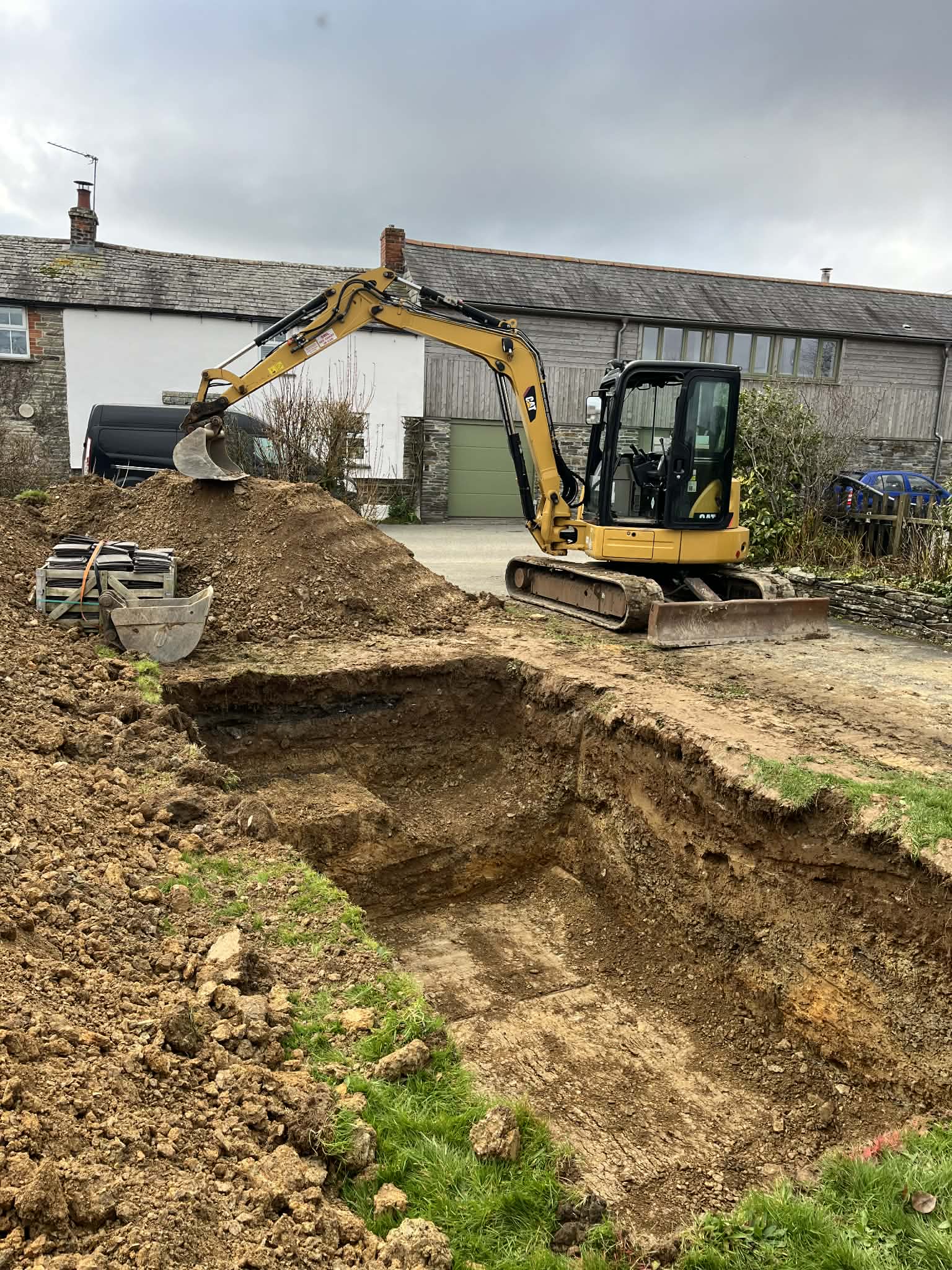 Rural groundwork machine preparing earthworks area