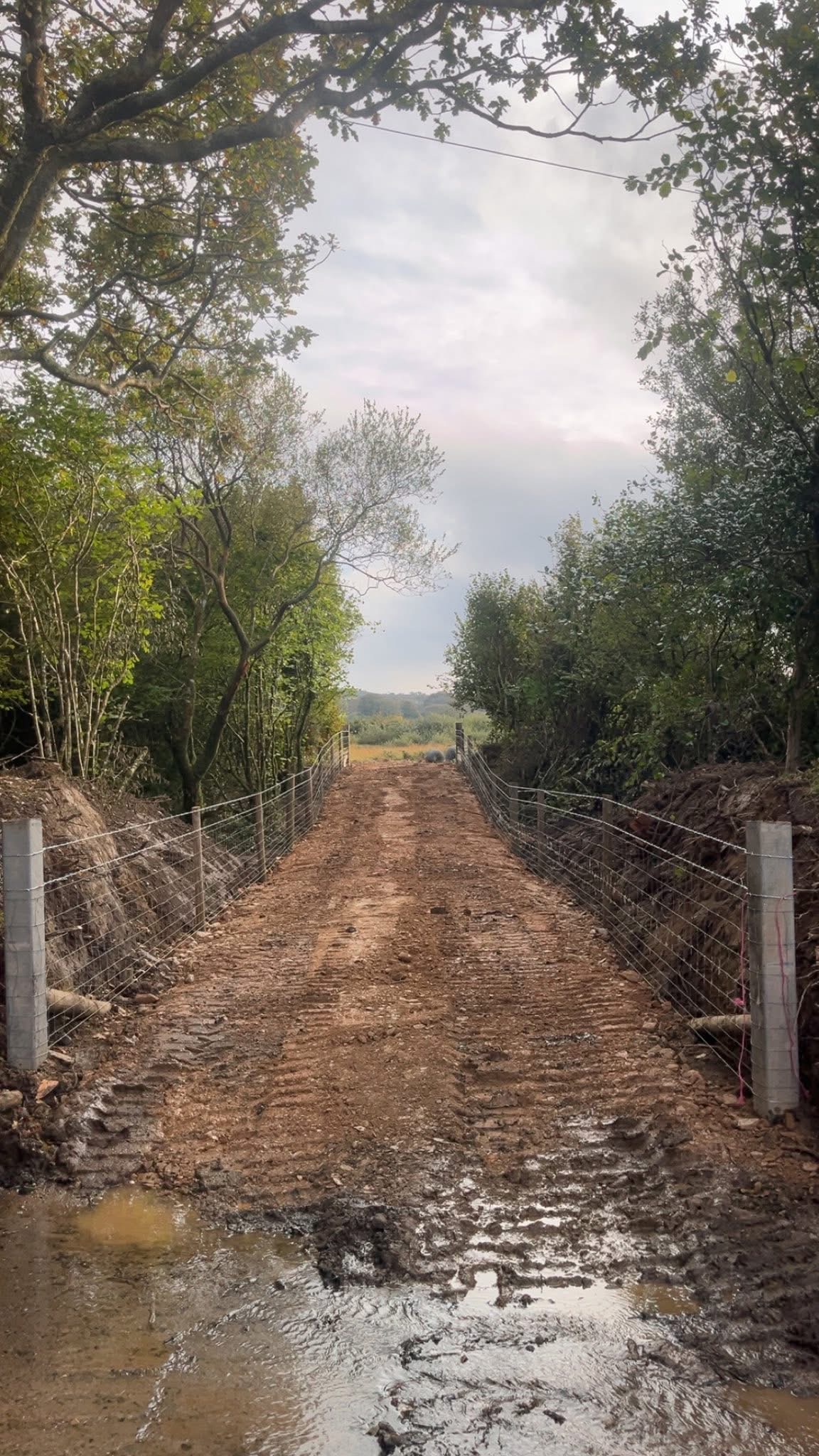 Newly installed access track across rural farmland