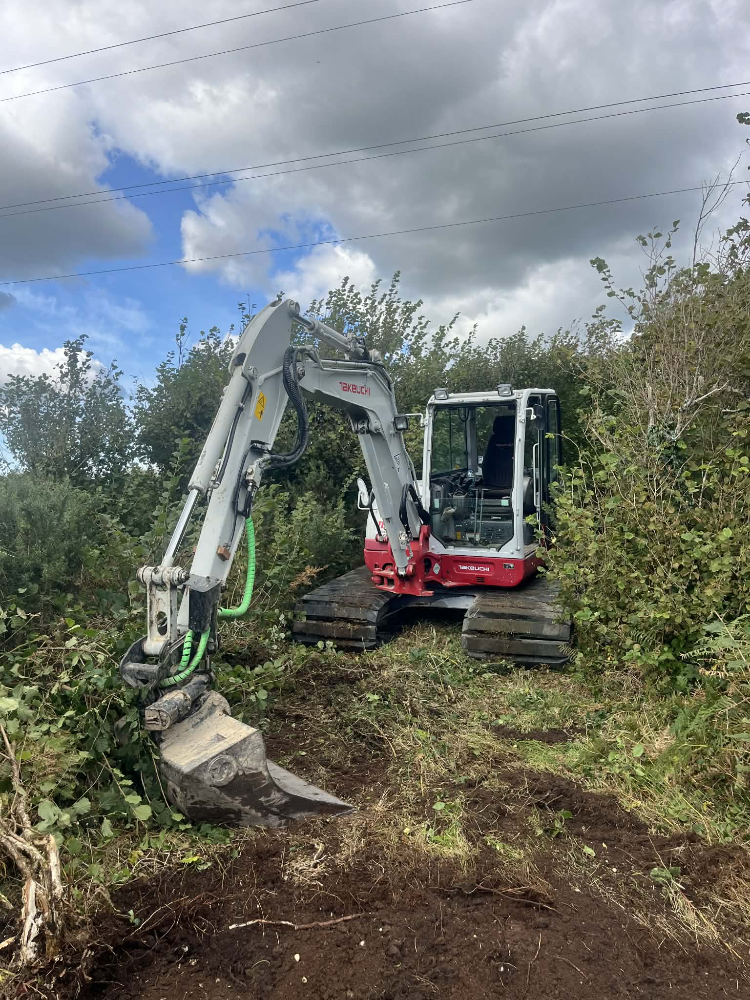 Machine work preparing rural site area